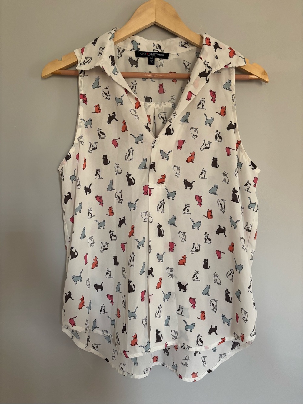 One Clothing White with Multicolor Cat Print Sheer Sleeveless Blouse